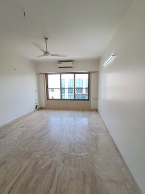 Room in 2 BHK Apartment at PR Wood Wind, Andheri East – for Rent