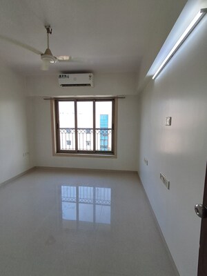 Room in 2 BHK Apartment at PR Wood Wind, Andheri East – for Rent