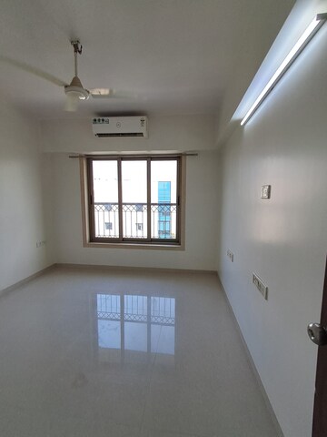 Room in 2 BHK Apartment at PR Wood Wind, Andheri East – for Rent
