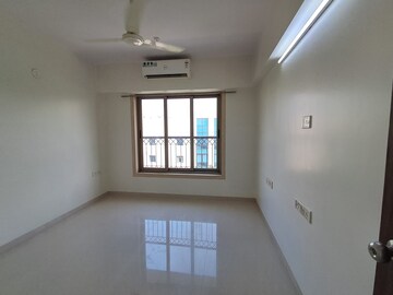 Room in 2 BHK Apartment at PR Wood Wind, Andheri East – for Rent