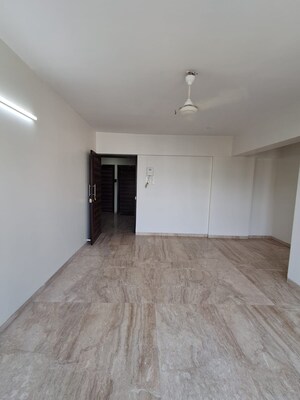 Room in 2 BHK Apartment at PR Wood Wind, Andheri East – for Rent