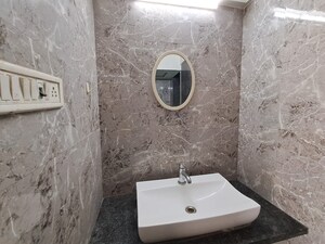 Bathroom in 2 BHK Apartment at PR Wood Wind, Andheri East – for Rent
