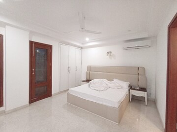 Bedroom in 3 BHK Apartment at Pamposh Enclave – for Rent