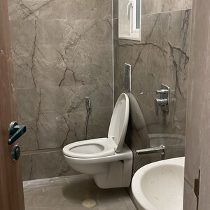 Bathroom in 1 BHK Apartment at Rushi Shiv Bliss, Valmik Nagar – for Rent