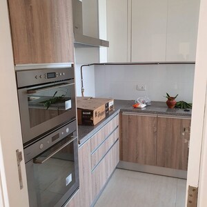 Kitchen in 3 BHK Apartment at DLF The Primus, Sector 82a – for Sale