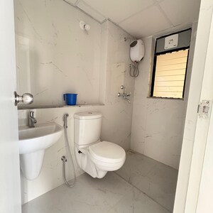 Bathroom in 3 BHK Apartment at Runwal Gardens Phase 3, Kalyan Shilphata Road – for Rent