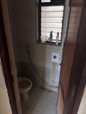 Bathroom in 1 BHK Apartment at Bharat Park Vistas, Andheri West – for Rent