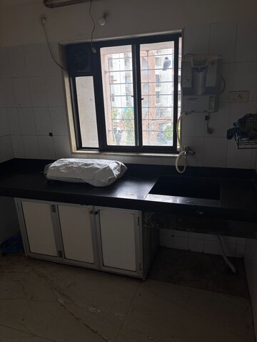 Kitchen in 1 BHK Apartment at Bharat Park Vistas, Andheri West – for Rent