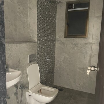 Bathroom in 2 BHK Apartment at Nirmal Zircon and Amethyst, Moti Nagar – for Rent