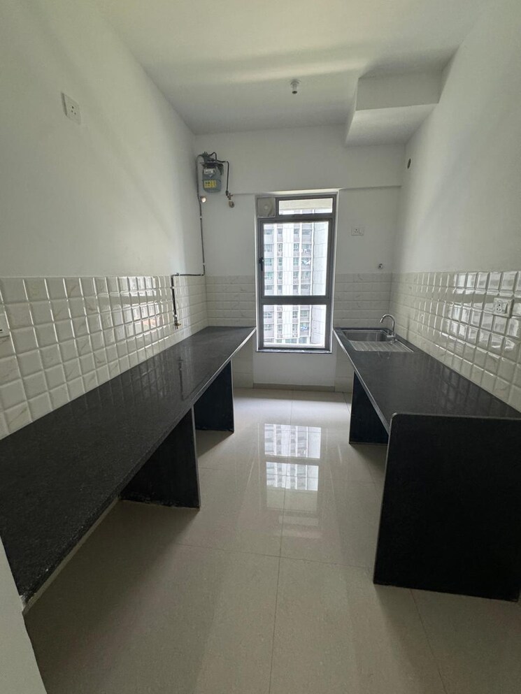 Kitchen, kalpataru-immensa 2 Bedroom 637 Sq.Ft. Apartment In Kolshet Road Thane 9479025