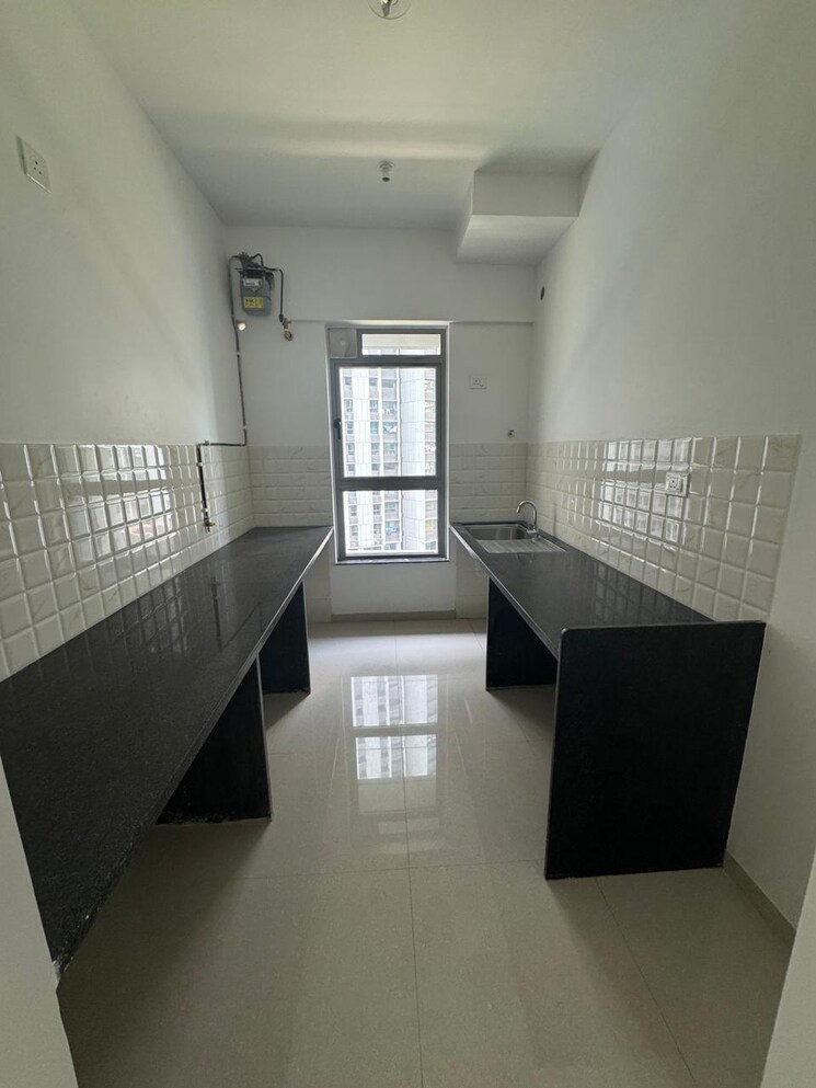 Kitchen, kalpataru-immensa 2 Bedroom 637 Sq.Ft. Apartment In Kolshet Road Thane 9479025