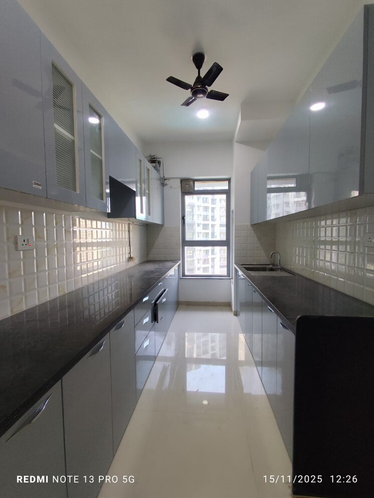 Kitchen, kalpataru-immensa 2 Bedroom 808 Sq.Ft. Apartment In Kolshet Road Thane 9479026