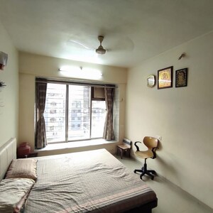 Living Room in 2 BHK Apartment at Runwal Greens, Nahur Gaothan – for Rent