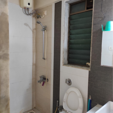 Bathroom in 2 BHK Apartment at Runwal Greens, Nahur Gaothan – for Rent