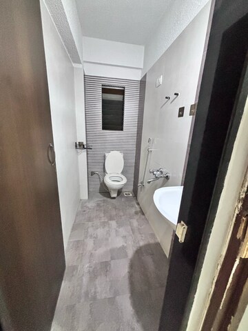 Bathroom in 1 BHK Apartment at Salasar Aarpan A Wing, Kanakia Park – for Rent