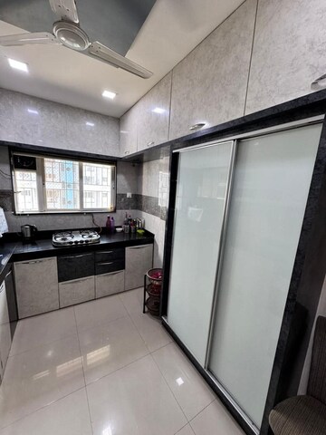 Kitchen in 2 BHK Apartment at Tanishq Apartment, Kharadi – for Rent