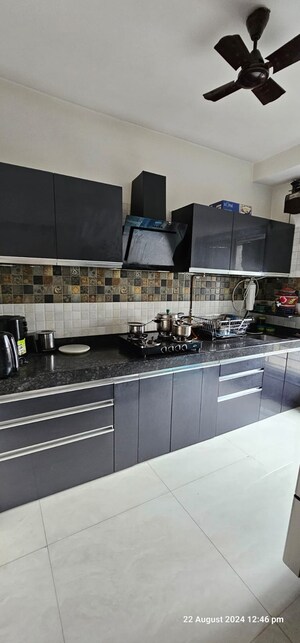 Kitchen in 1 BHK Apartment at Puranik Rumah Bali, Ghodbunder Road – for Rent