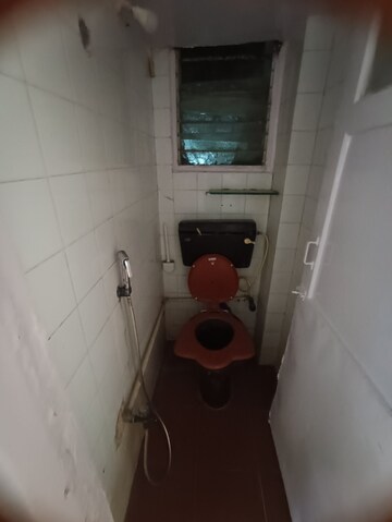 Bathroom in 1 BHK Apartment at Rishikesh CHS, Malad West – for Rent