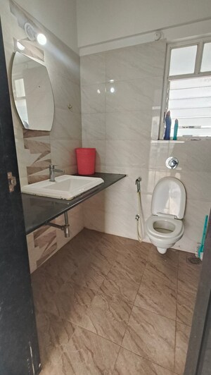 Bathroom in 2 BHK Apartment at Kolte Patil Langston, Kharadi – for Rent