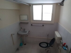 Bathroom in 2.5 BHK Apartment at Meenaxi Apartments, Shivaji Nagar – for Sale