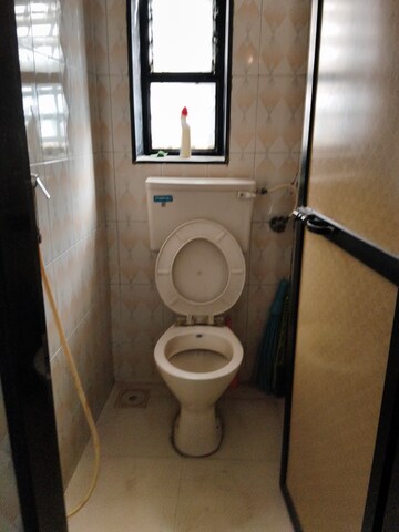 Bathroom in 2 BHK Apartment at Neminath Palace, Santacruz East – for Rent