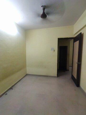 Bedroom in 1 BHK Apartment at Chamunda Enclave, Airoli Sector 8a – for Sale