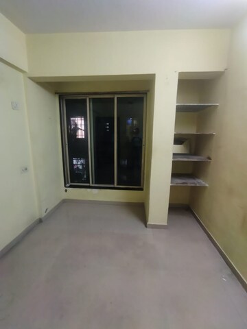 Bedroom in 1 BHK Apartment at Chamunda Enclave, Airoli Sector 8a – for Sale