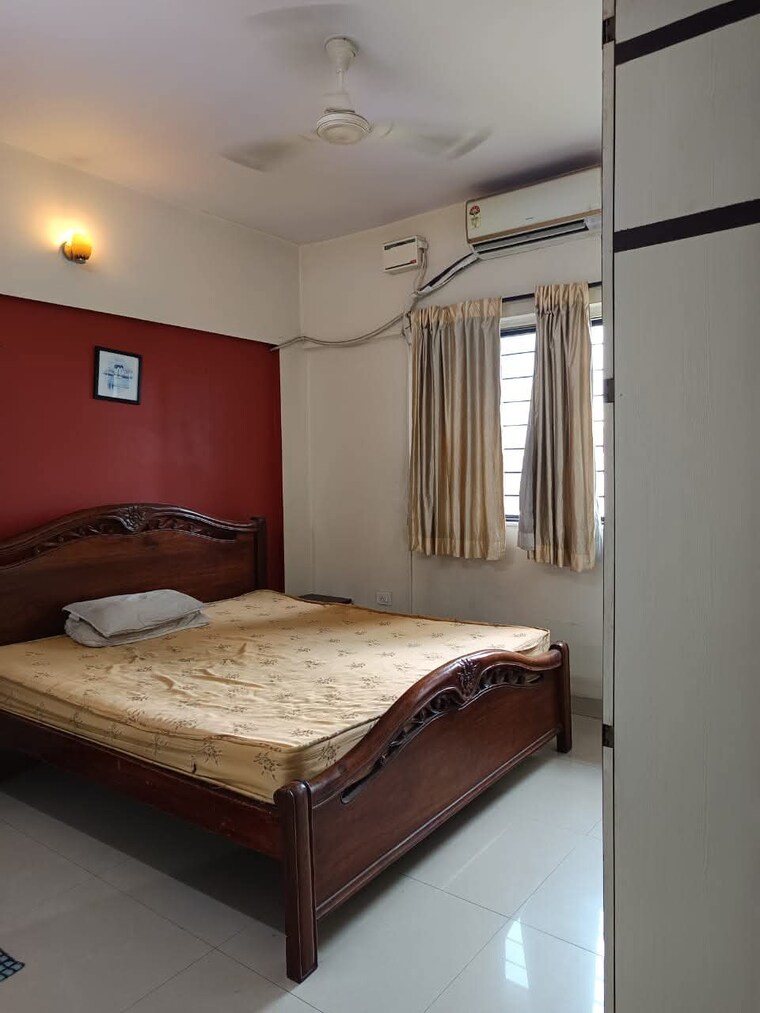 Bedroom, magarpatta-city-cosmos 2 Bedroom 1050 Sq.Ft. Apartment In Magarpatta Road Pune 9479361