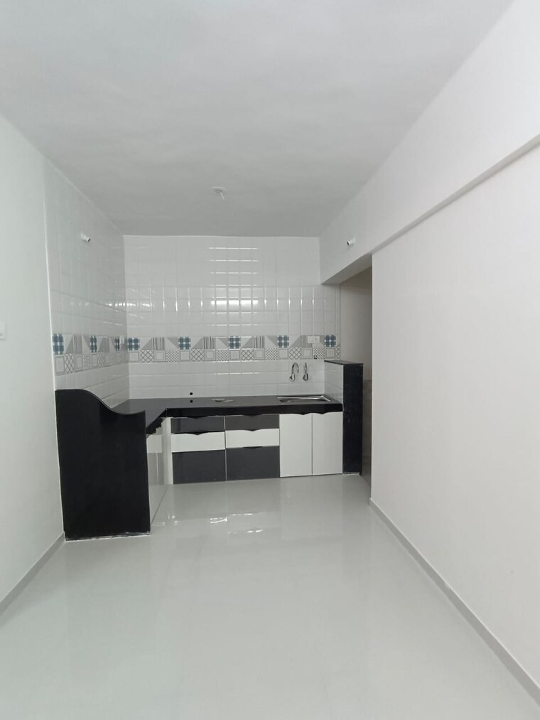 Kitchen, renuka-gloria 2 Bedroom 812 Sq.Ft. Apartment In Ravet Pune 9479496