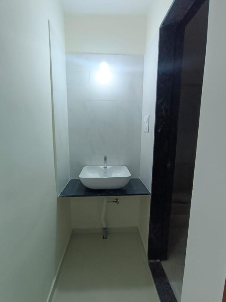 Bathroom, renuka-gloria 2 Bedroom 812 Sq.Ft. Apartment In Ravet Pune 9479496