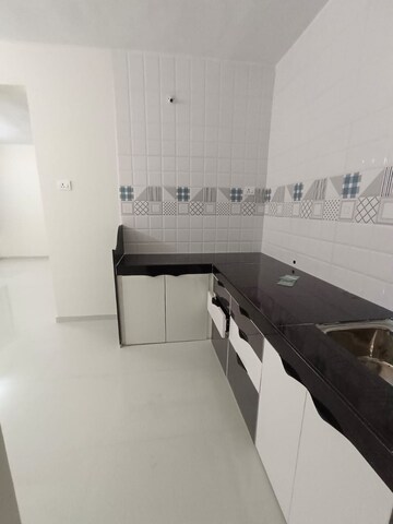 Kitchen in 2 BHK Apartment at Renuka Gloria, Ravet – for Rent