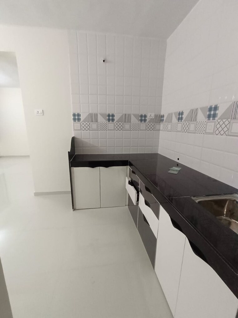 Kitchen, renuka-gloria 2 Bedroom 812 Sq.Ft. Apartment In Ravet Pune 9479496