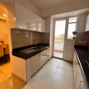 Kitchen in 4 BHK Apartment at Rishita Manhattan, Sarsawan – for Sale