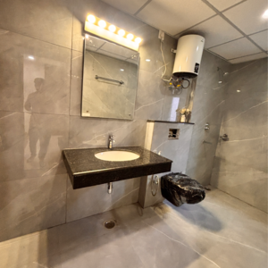 Bathroom in 4 BHK Apartment at Rishita Manhattan, Sarsawan – for Sale