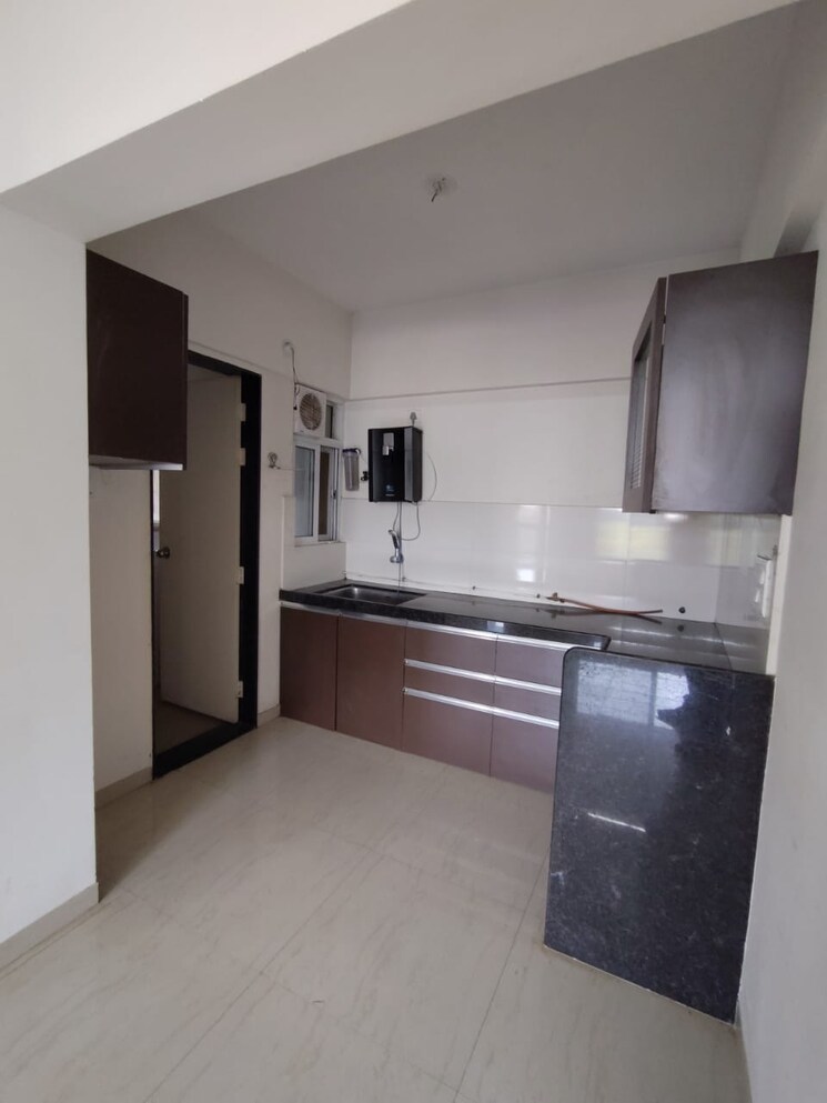 Kitchen, pandit-javdekar-red-earth 1 Bedroom 695 Sq.Ft. Apartment In Pirangut Pune 9479653
