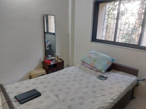 Bedroom in 2 BHK Apartment at Sector 15 Kopar Khairane – for Rent