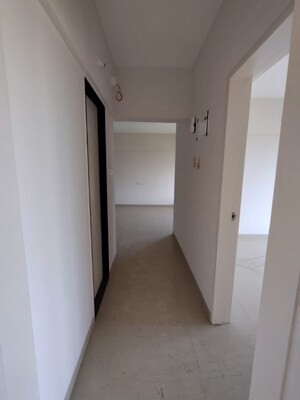 Living Room in 2 BHK Apartment at Pandit Javdekar Red Earth, Pirangut – for Rent