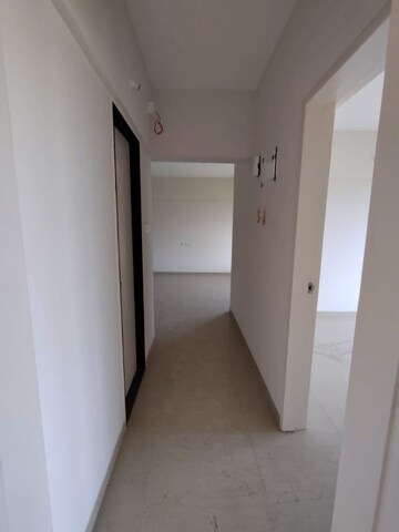 Living Room in 2 BHK Apartment at Pandit Javdekar Red Earth, Pirangut – for Rent