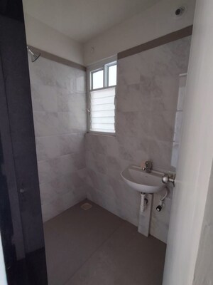 Bathroom in 2 BHK Apartment at Pandit Javdekar Red Earth, Pirangut – for Rent