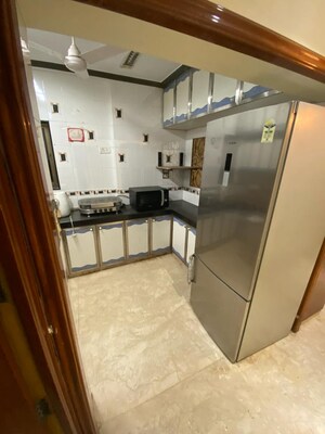 Kitchen in 3 BHK Apartment at Brindaban CHS, Poonam Nagar – for Rent