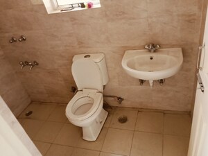 Bathroom in 2 BHK Apartment at Wave Dream Homes, Wave City – for Rent