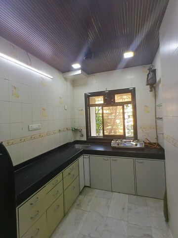 Kitchen in 2 BHK Apartment at Gokuldham Complex, Goregaon East – for Rent