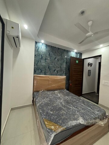 Bedroom in 1 RK Builder Floor at Ansal Sushant Lok I, Sector 43 – for Rent