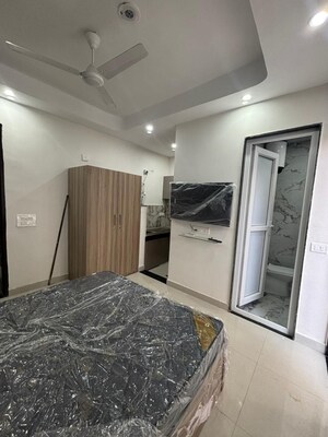 Bedroom in 1 RK Builder Floor at Ansal Sushant Lok I, Sector 43 – for Rent