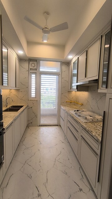 Kitchen in 4 BHK Apartment at DLF The Icon, Dlf Phase V – for Sale