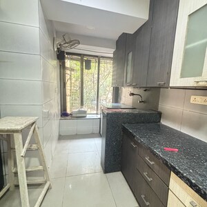 Kitchen in 3 BHK Apartment at New Mhada Towers, Sv Patel Nagar – for Rent