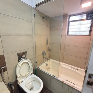 Bathroom in 3 BHK Apartment at New Mhada Towers, Sv Patel Nagar – for Rent