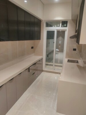 Kitchen in 3 BHK Apartment at Bhagwati Celestria, T.T.C. Industrial Area – for Sale