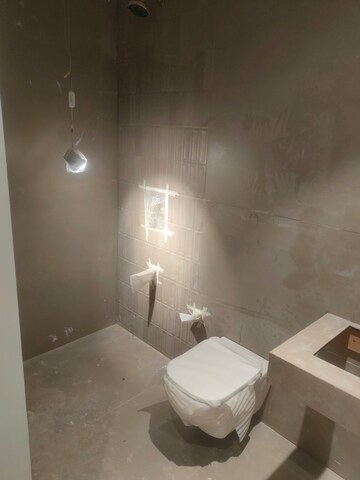 Bathroom in 3 BHK Apartment at Bhagwati Celestria, T.T.C. Industrial Area – for Sale