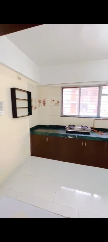 Kitchen in 1 BHK Apartment at Karan Rhea, Wadegaon – for Rent